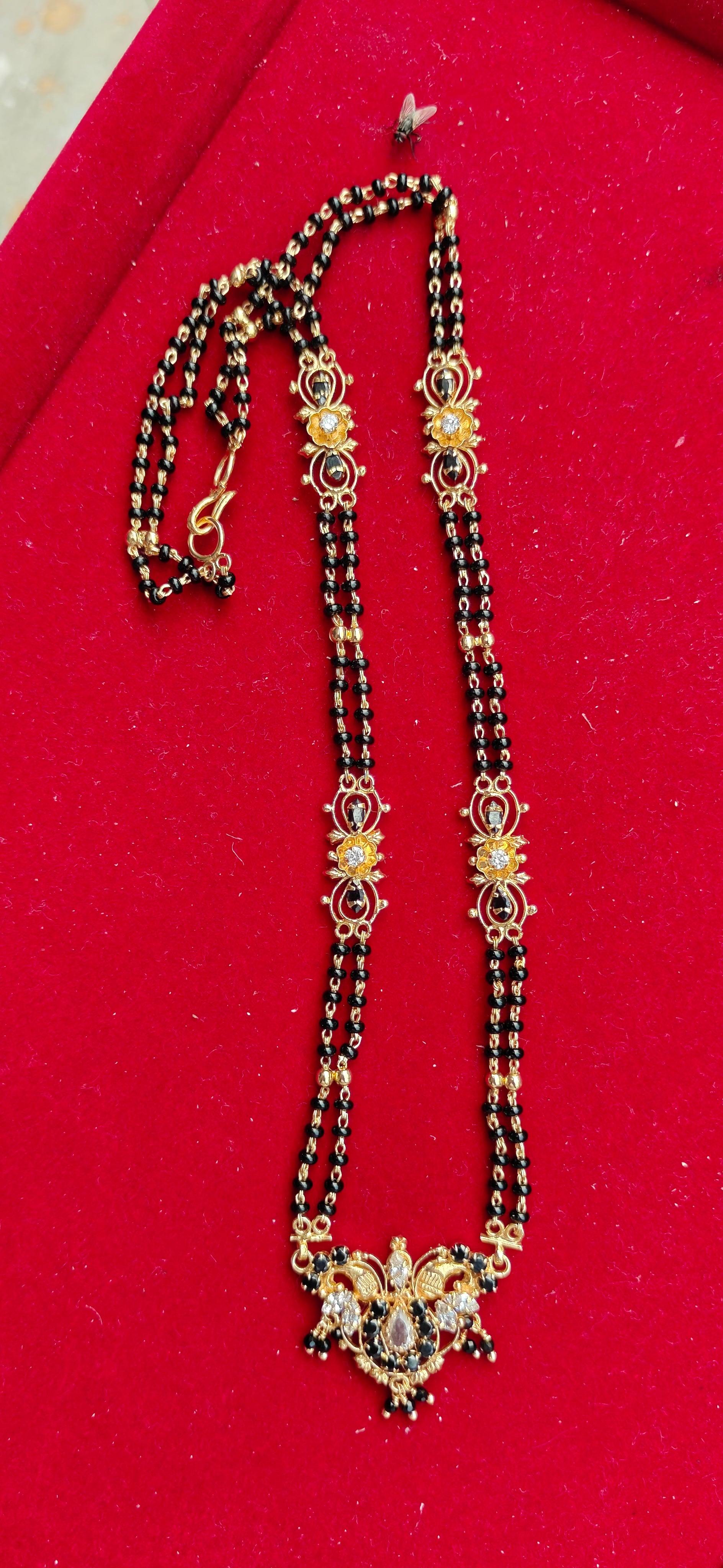 short black beads